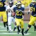 Michigan wide receiver Dennis Norfleet runs the ball against Central Michigan during the first half at Michigan Stadium on Saturday, August 31, 2013. Melanie Maxwell | AnnArbor.com
